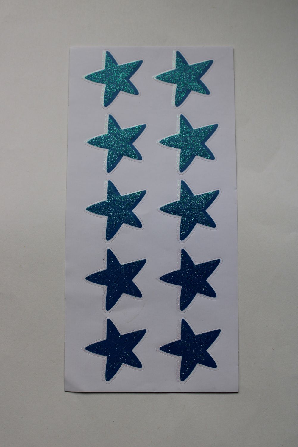 Stickersheet met blauwe glitter sterren