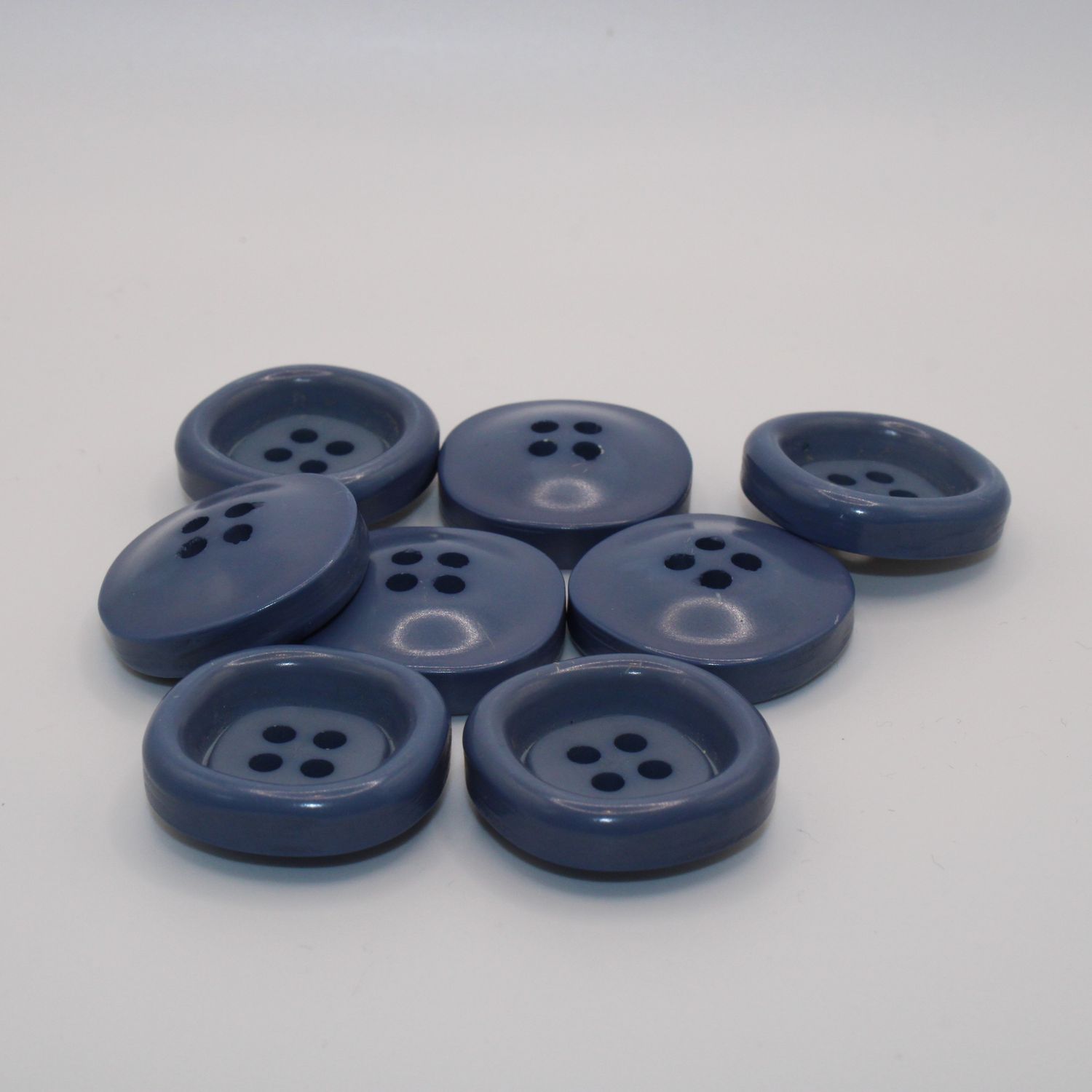 Set van 8 blauwe knopen