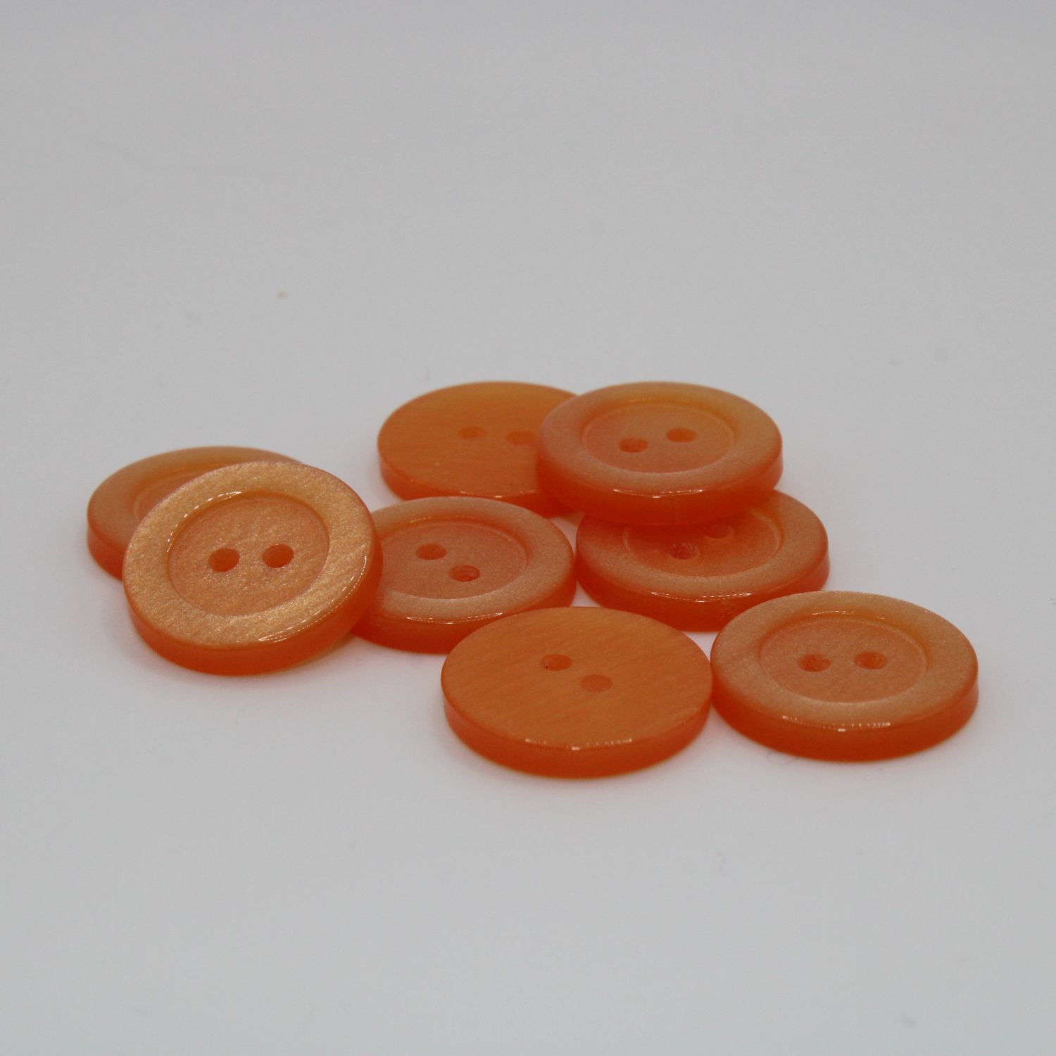 Set van 8 oranje knopen