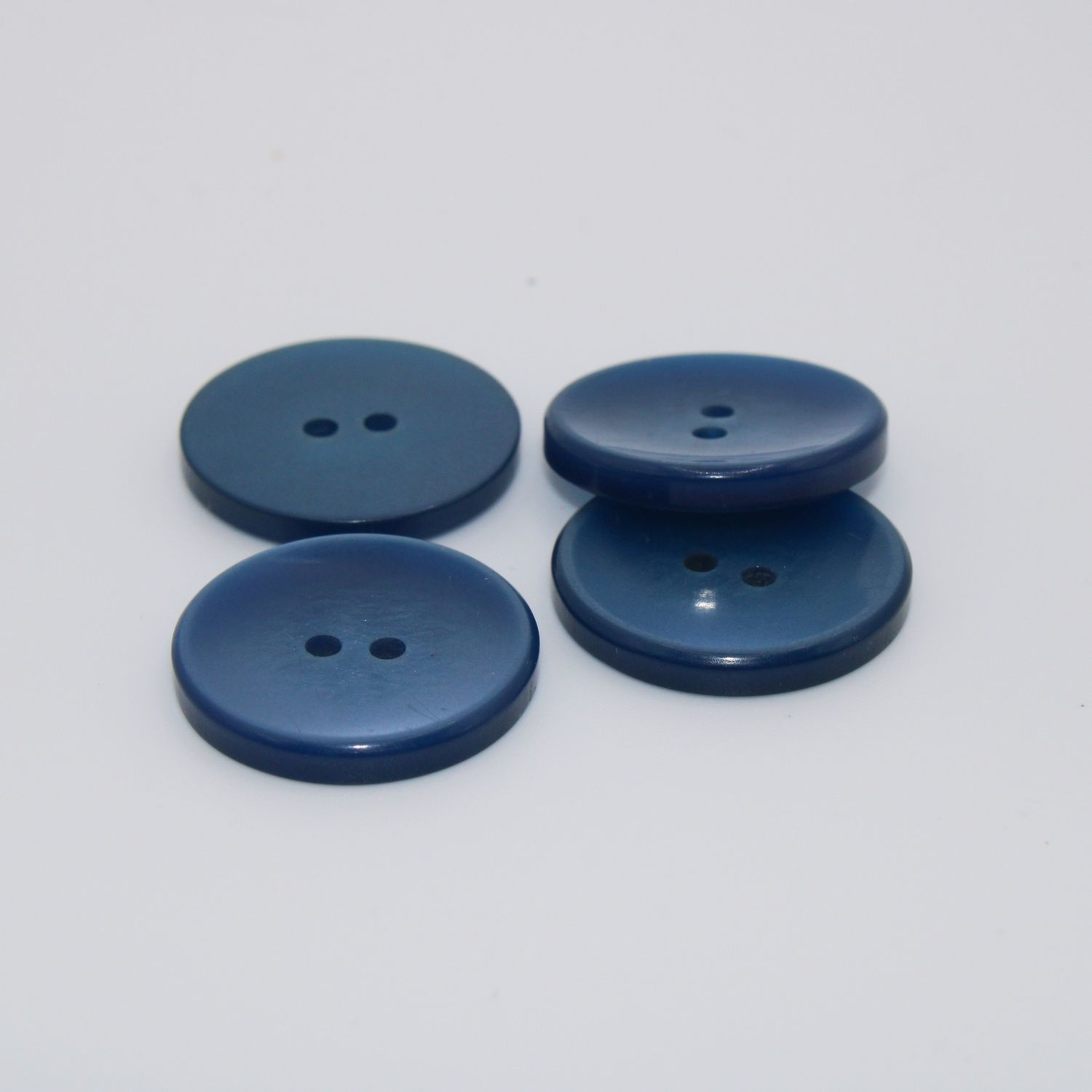 Set van 4 blauwe knopen