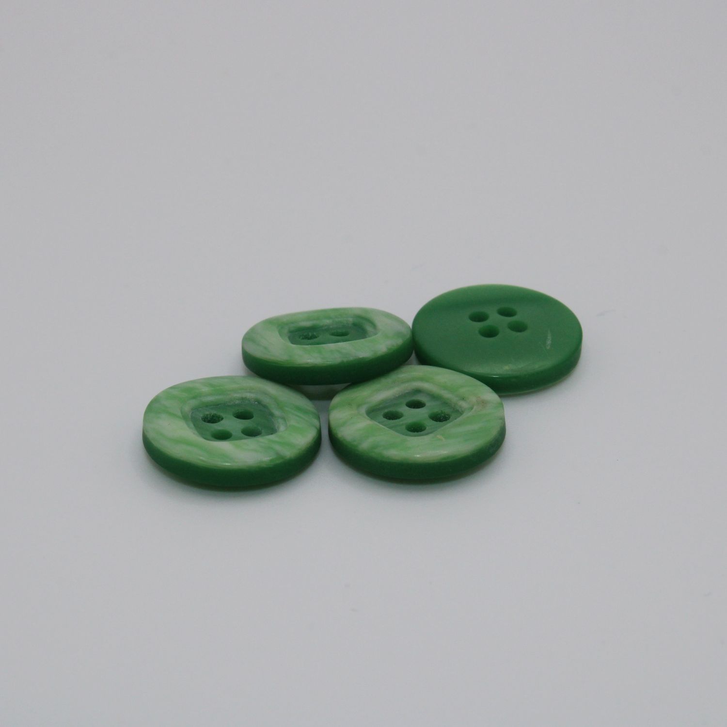 Set van 4 groene knopen