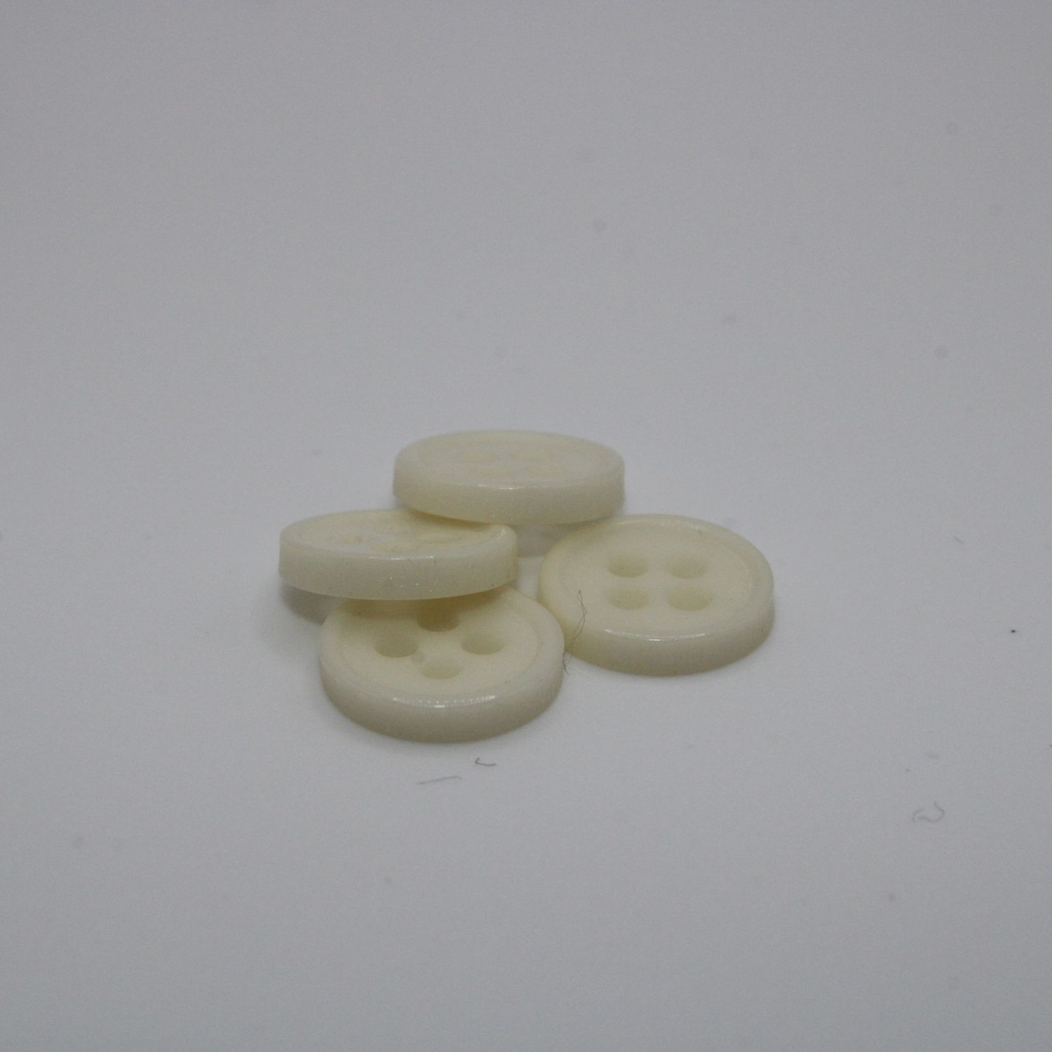 Set van 4 witte knopen