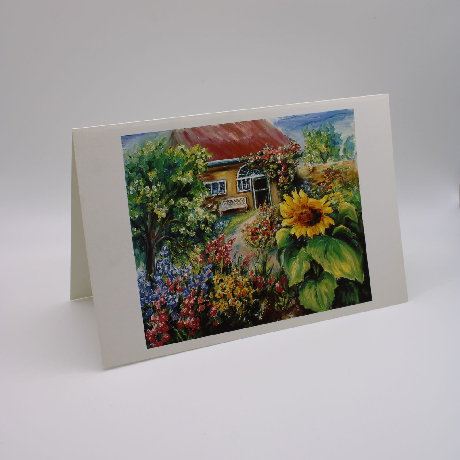 Kaartje met landhuis en bloemen