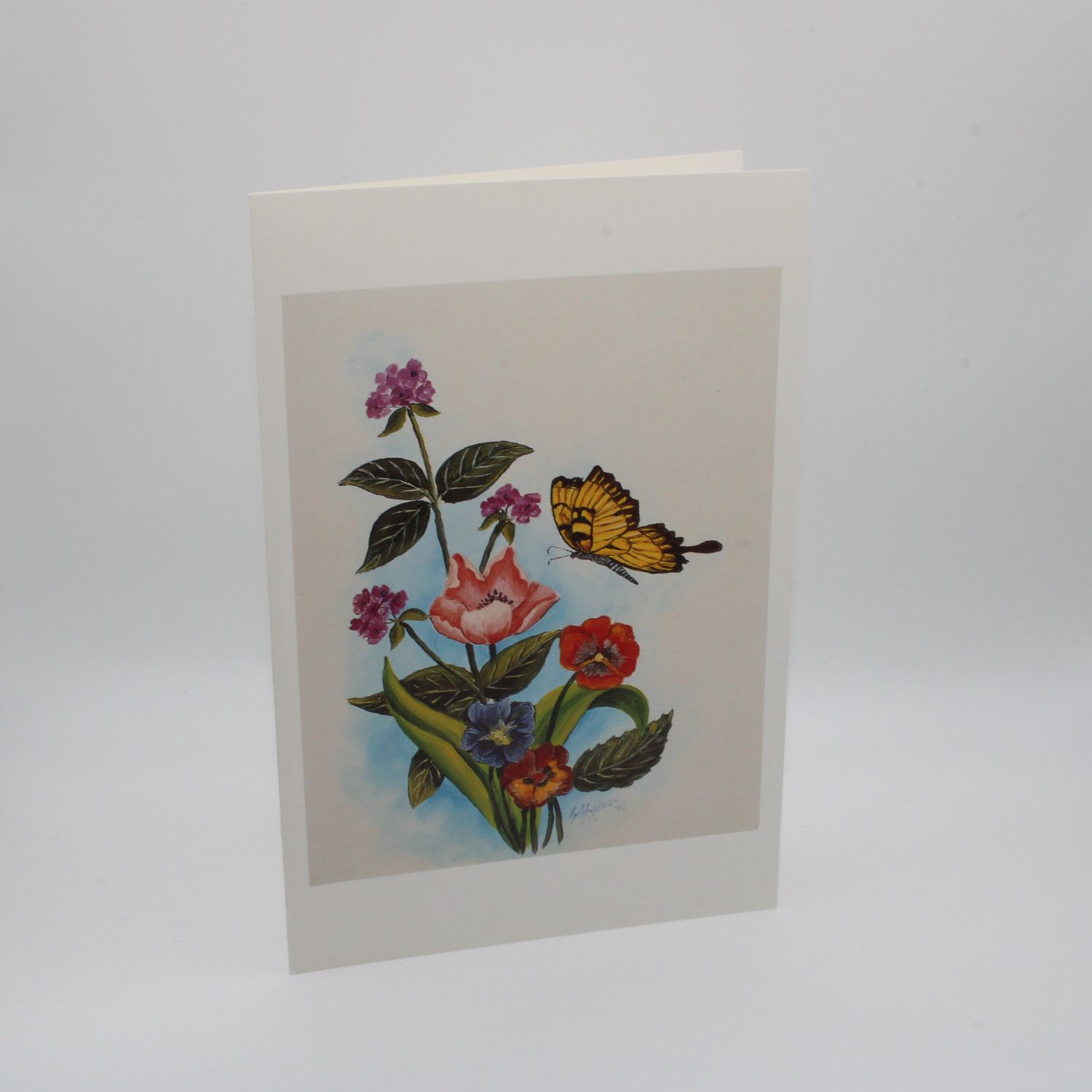 Kaartje met bloemen en vlinder
