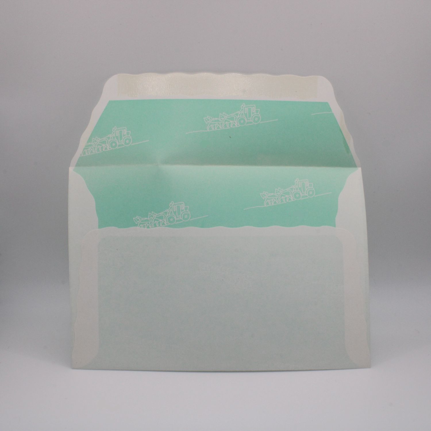 Envelop met blauwgroene binnenkant