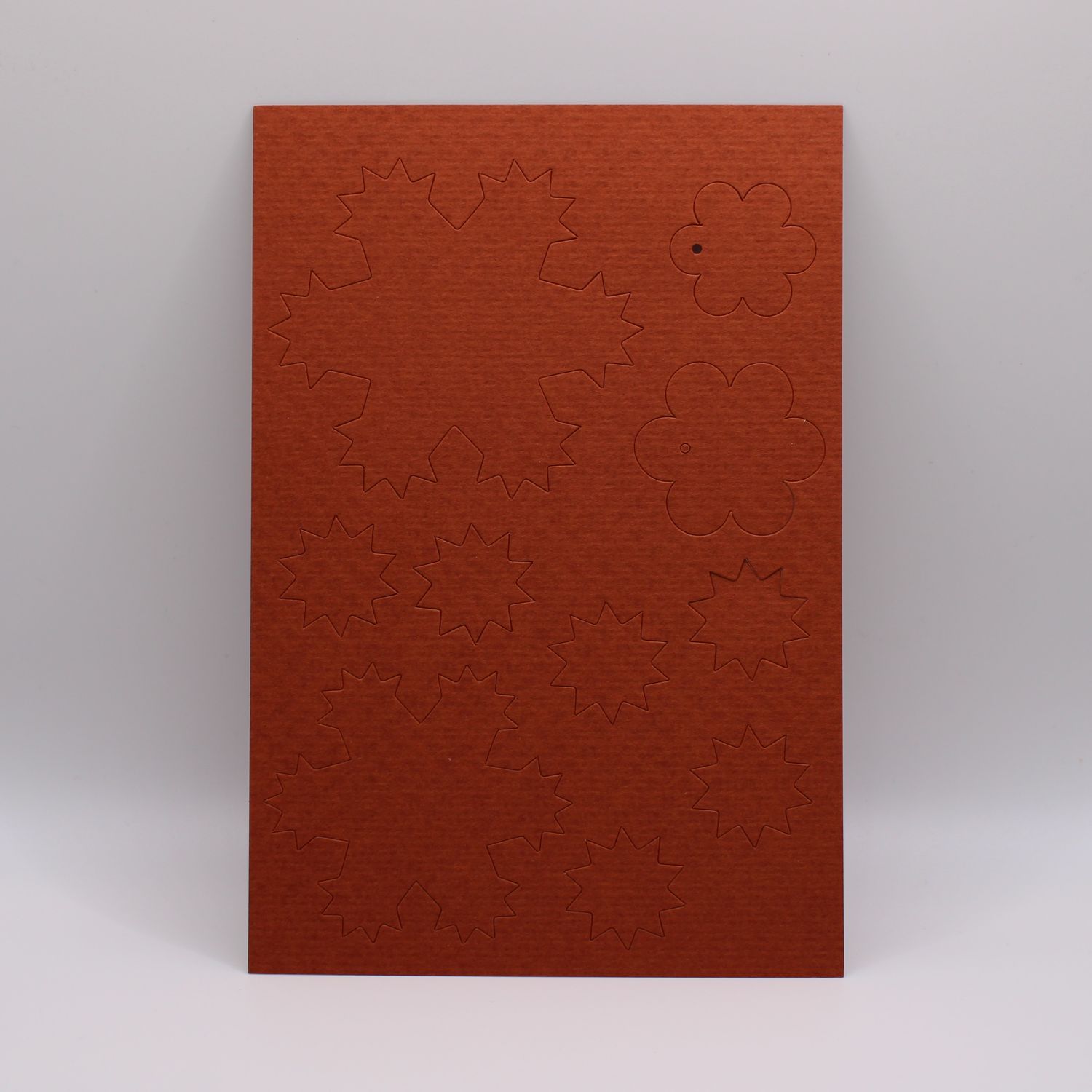 Oranje kaartje met vormen