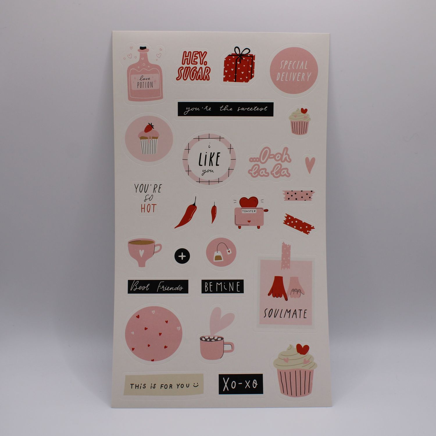Sheet met roze stickers