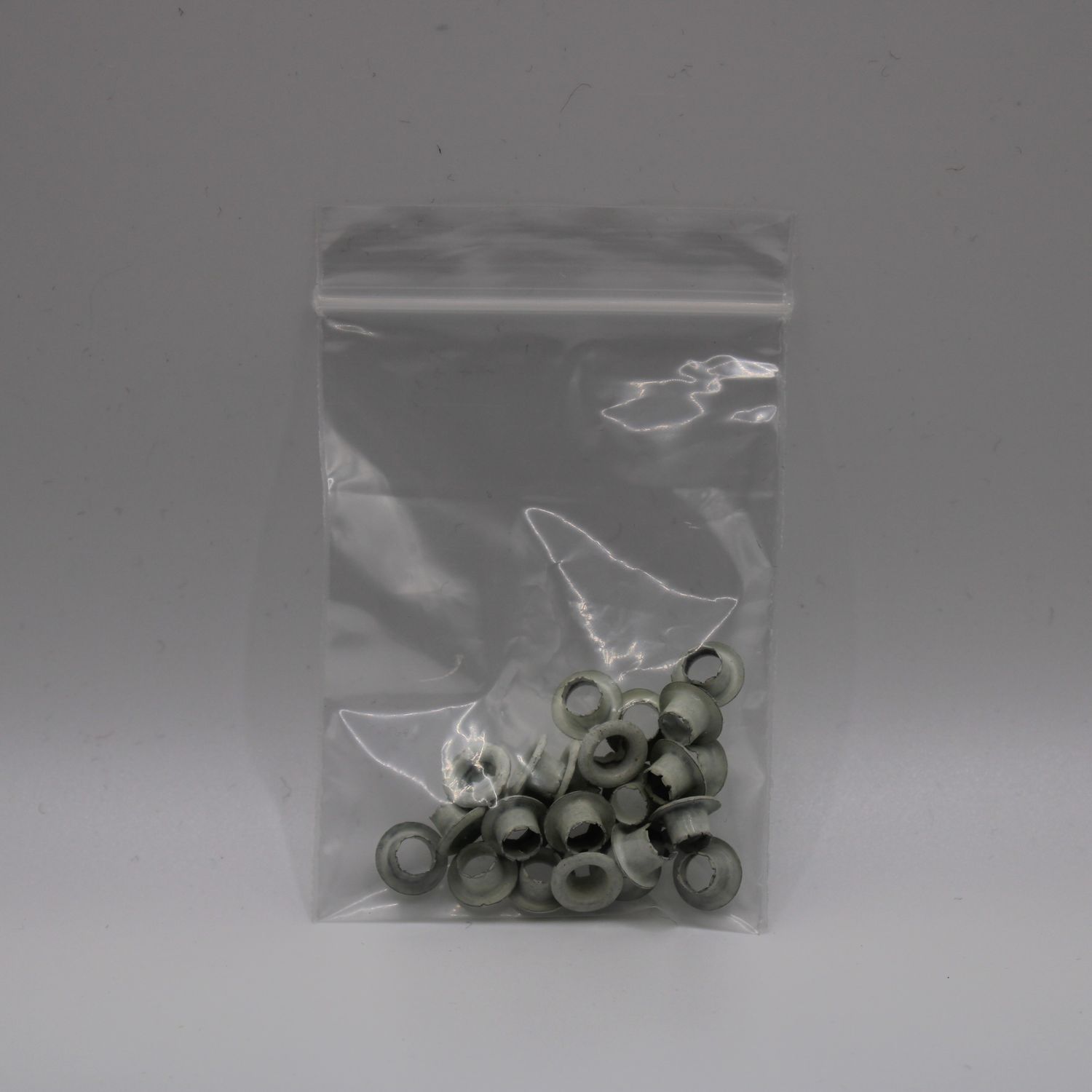 Witte eyelets
