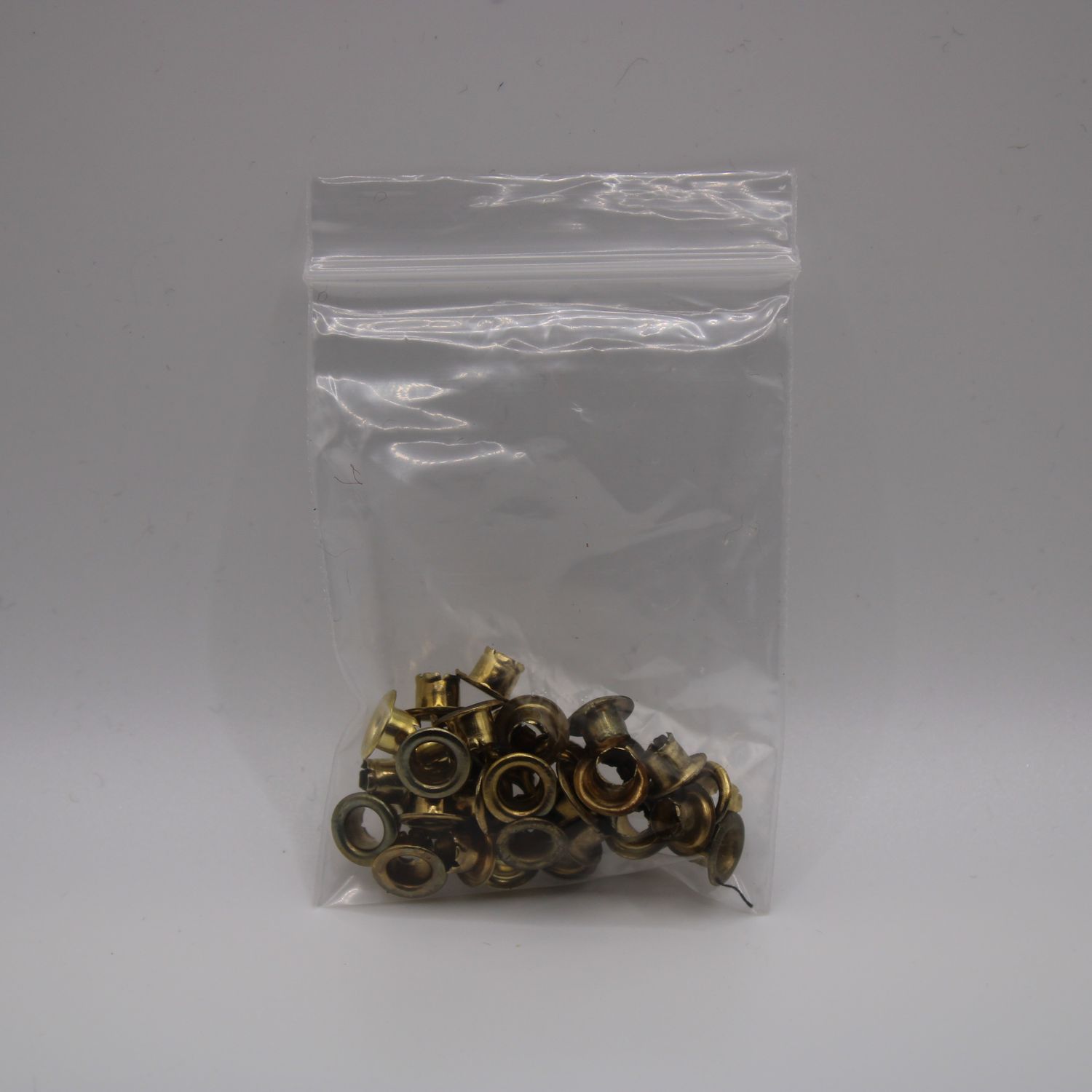 Goudkleurige eyelets