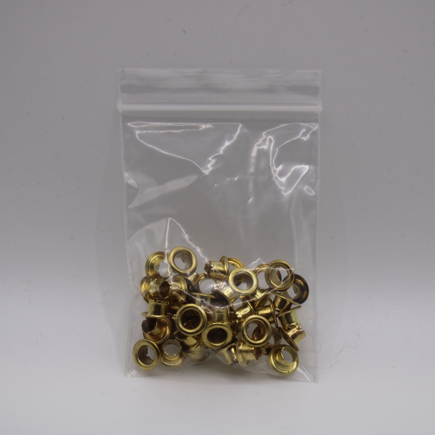 Goudkleurige eyelets