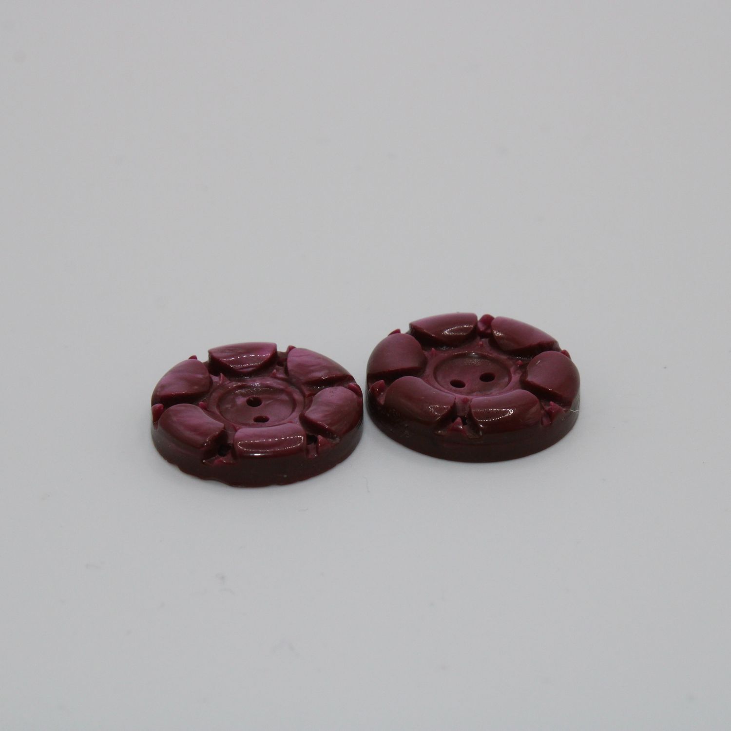 Set van 2 bordeaux knopen