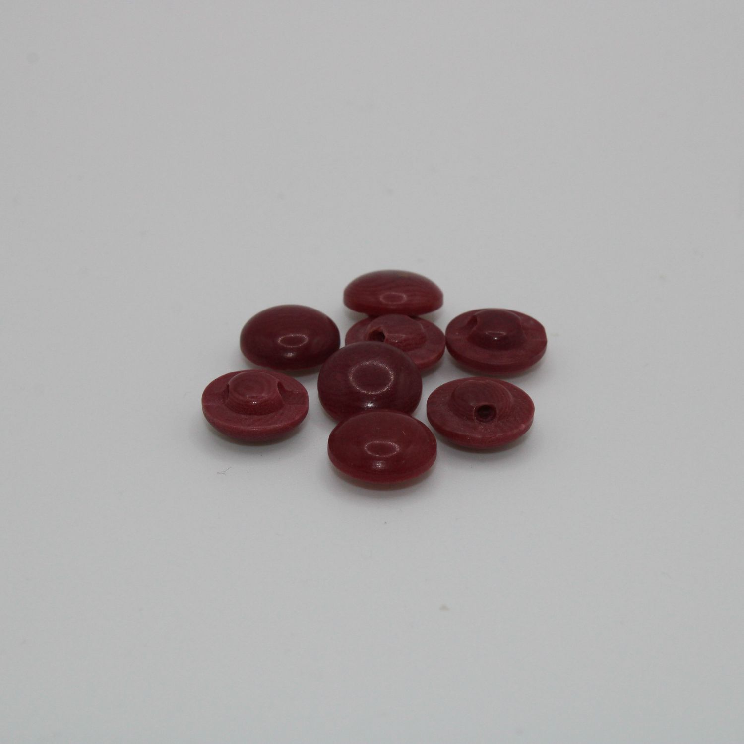 Set van 8 bordeaux knopen