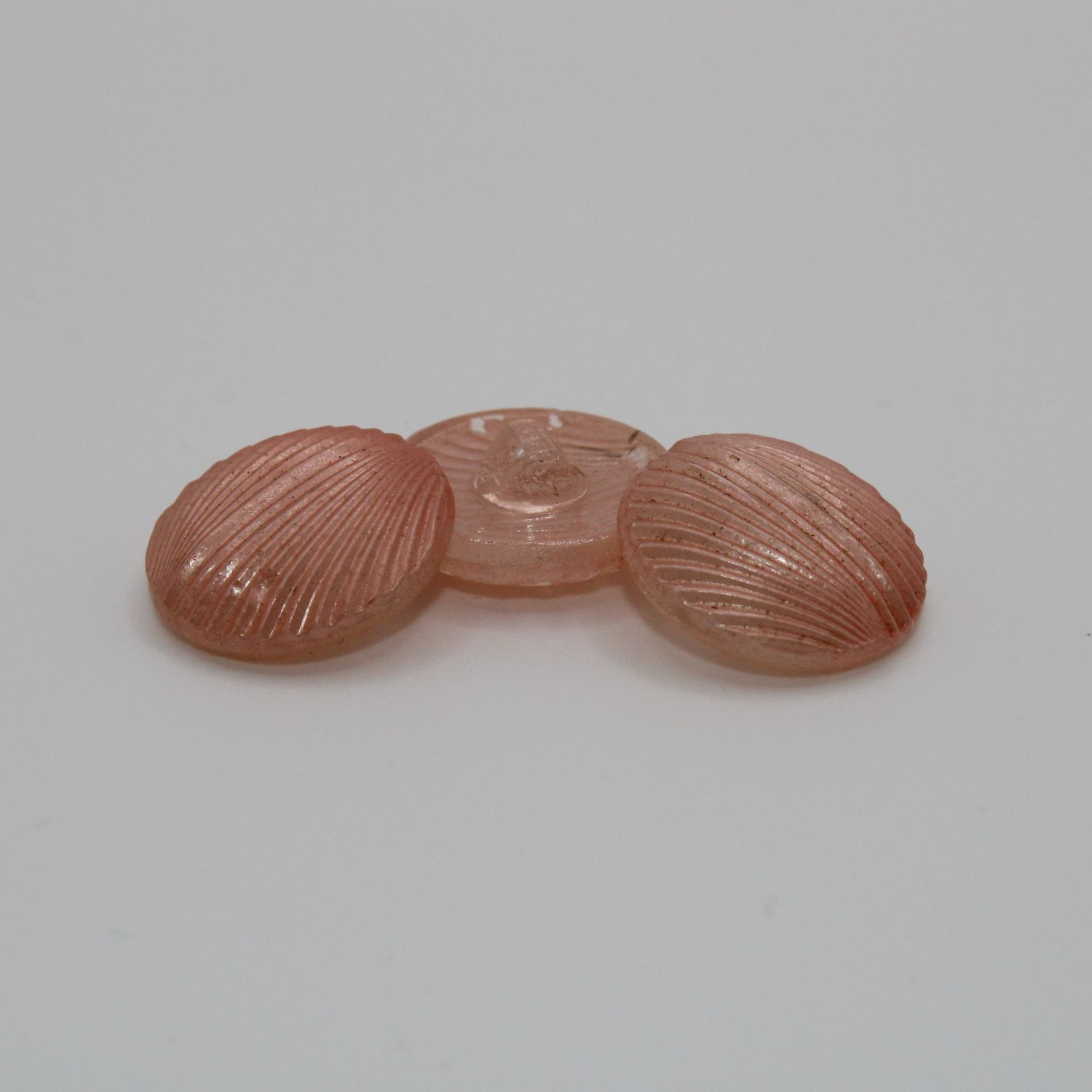 Set van 3 roze knopen