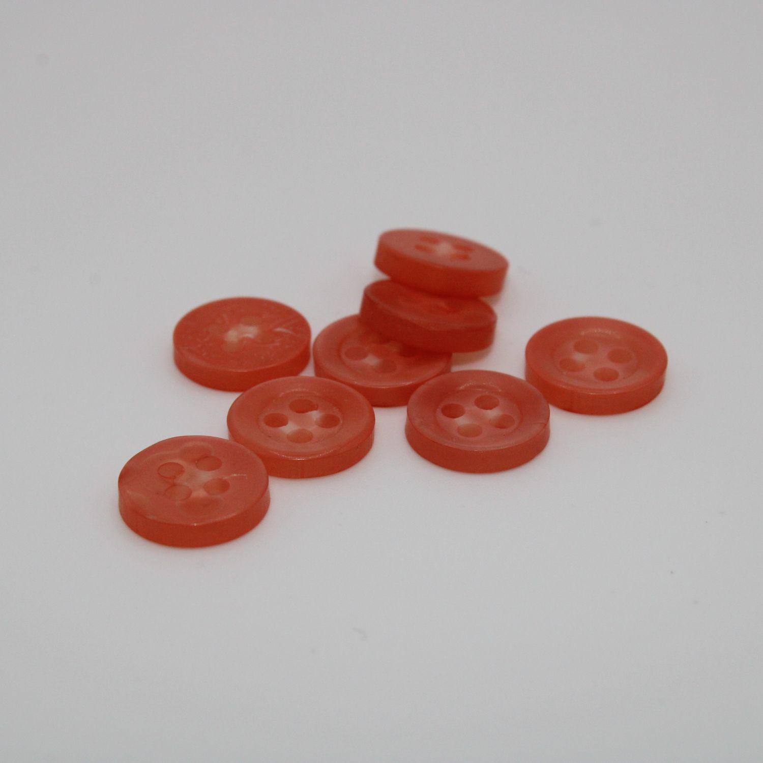 Set van 8 roze knopen