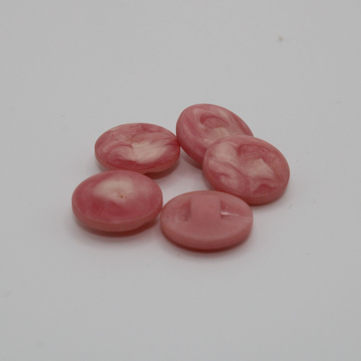 Set van 6 roze knopen