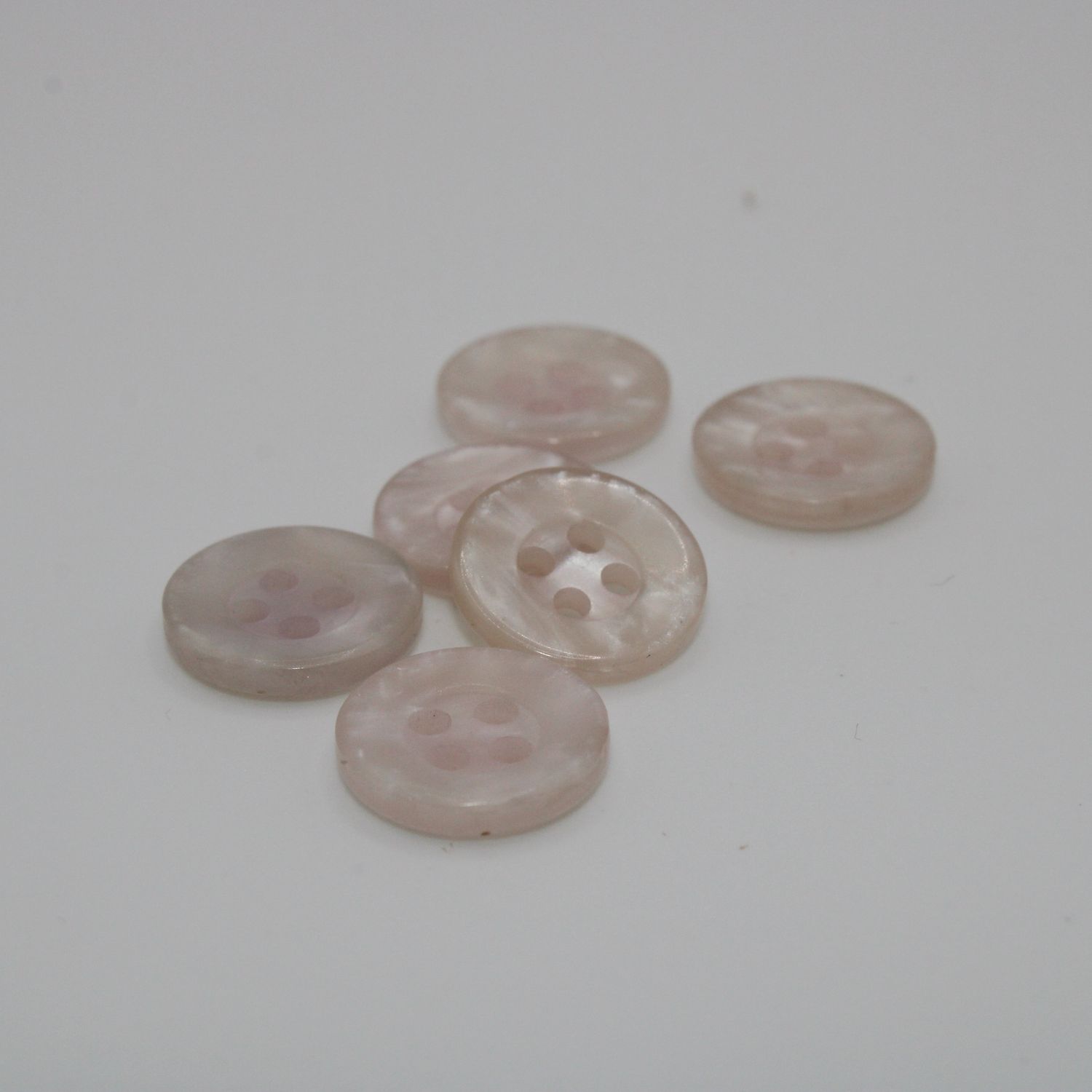 Set van 5 lichtroze knopen