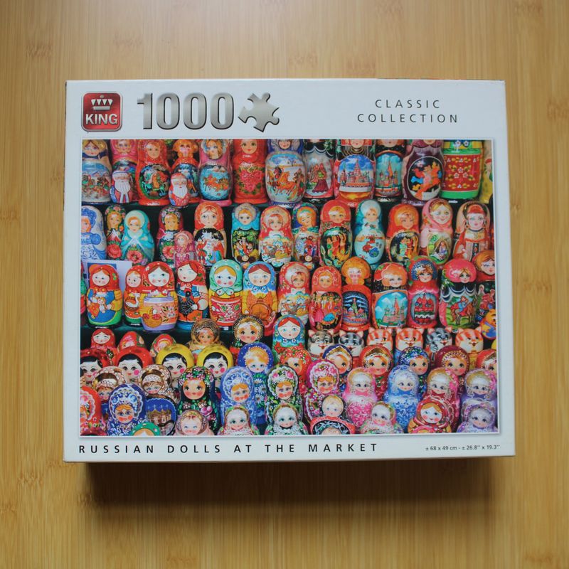 Puzzel 1000 stukjes - Russian dolls at the market