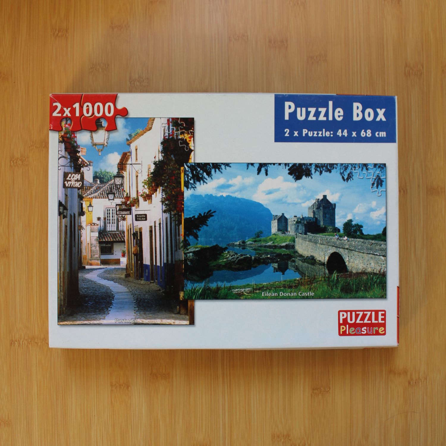 Puzzel 2 x 1000 stukjes - Portugal + Eilean Donan Castle