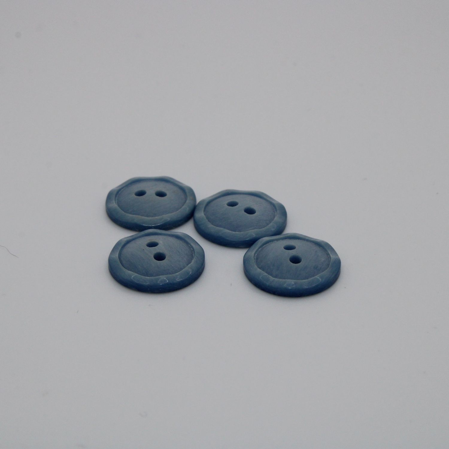 Set van 4 lichtblauwe knopen