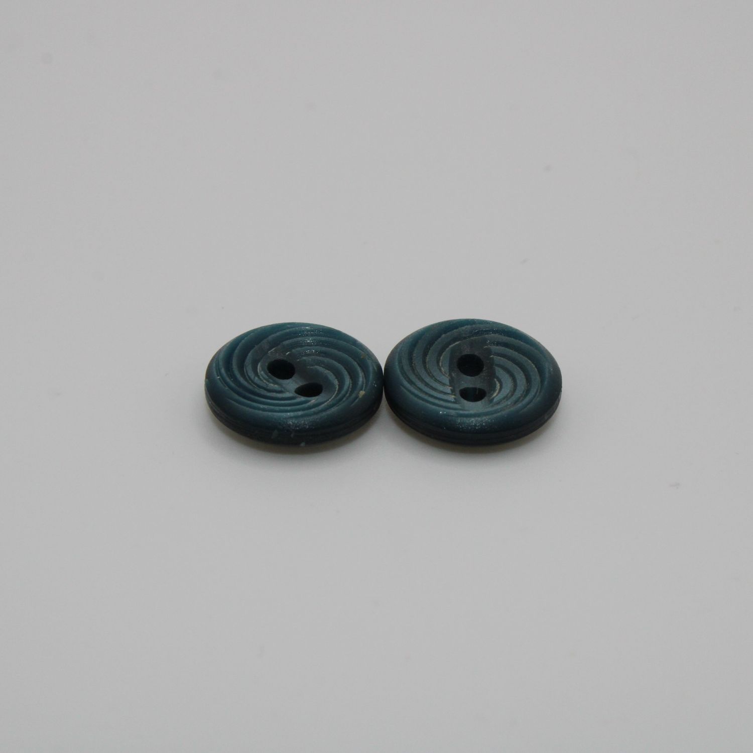 Set van 2 blauwgroene knopen