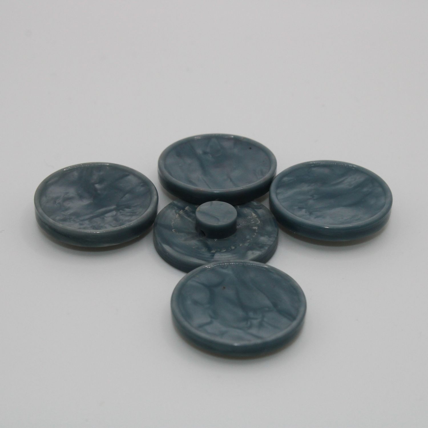 Set van 5 blauwgroene knopen
