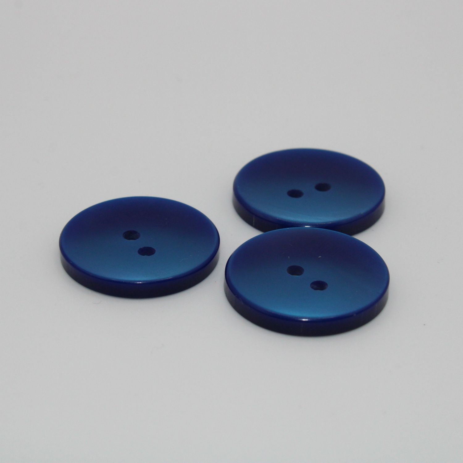 Set van 3 blauwe knopen