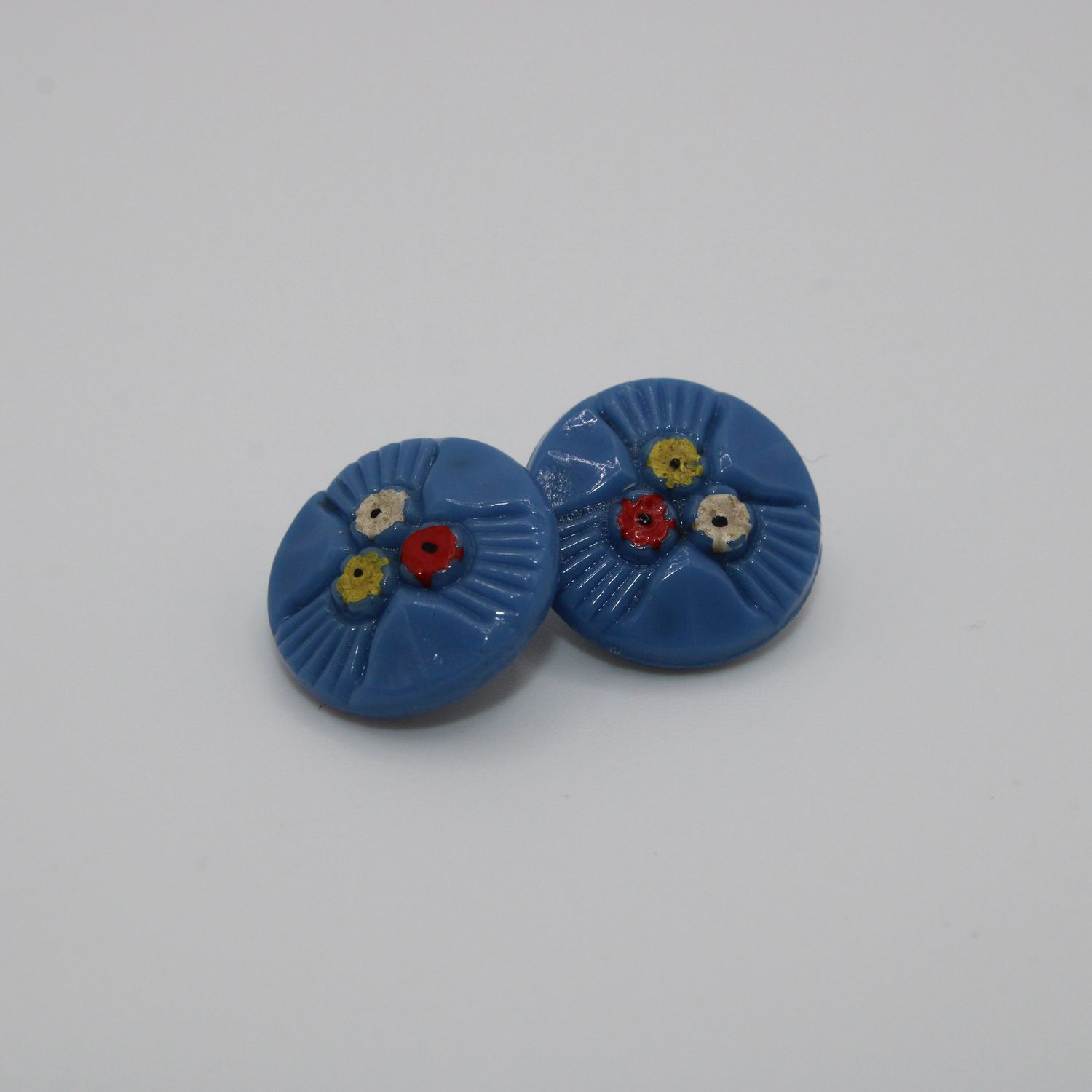 Set van 2 blauwe knopen met bloemen