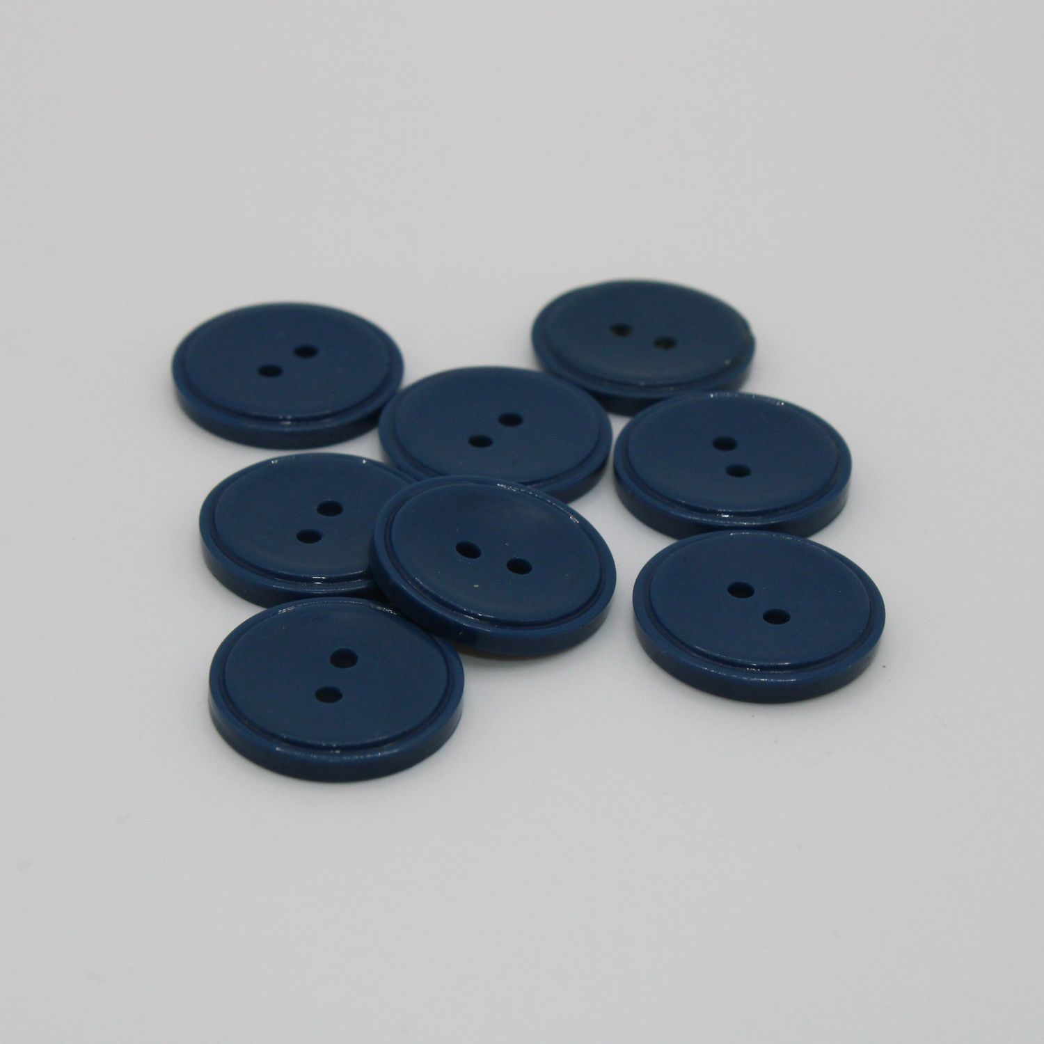 Set van 8 blauwe knopen