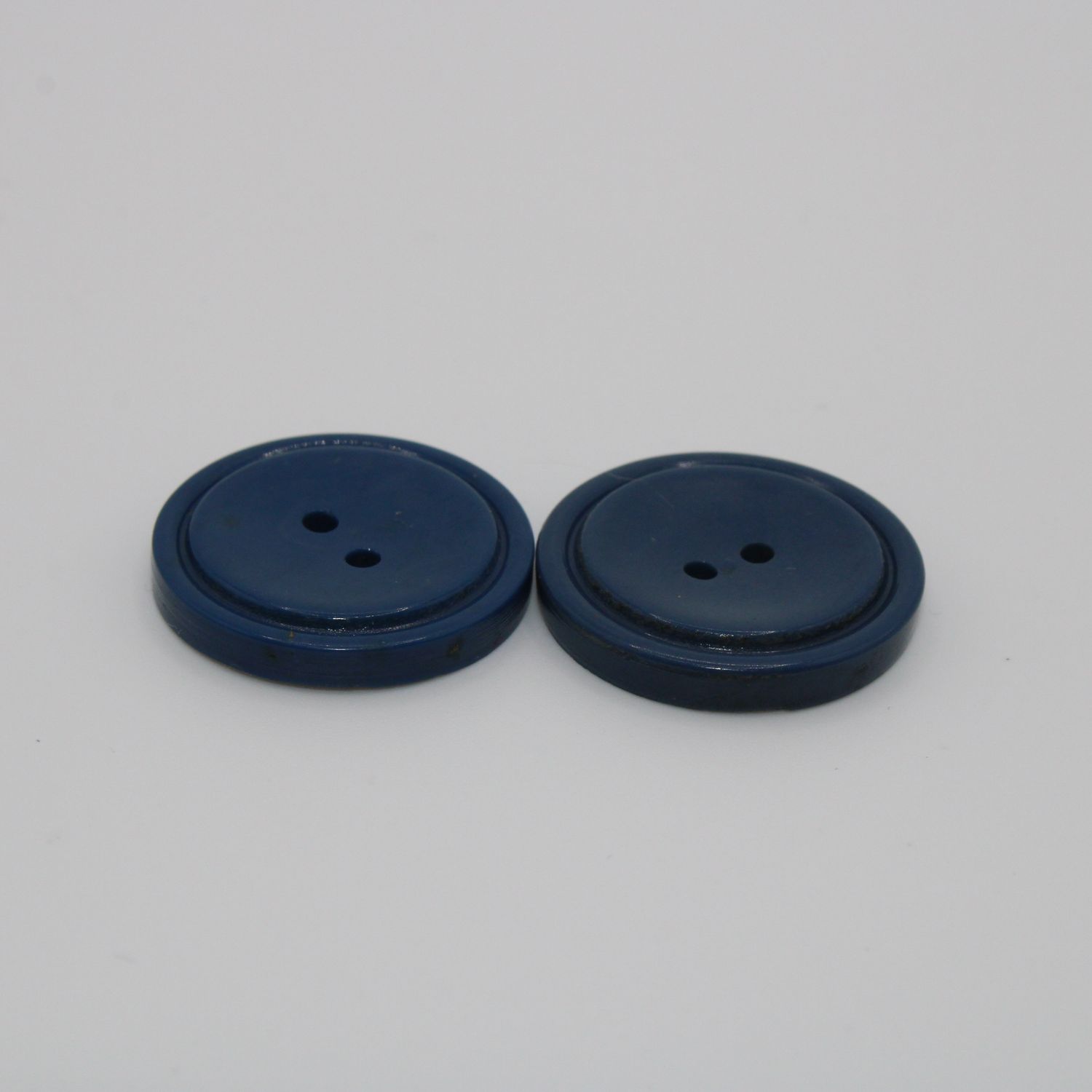 Set van 2 blauwe knopen