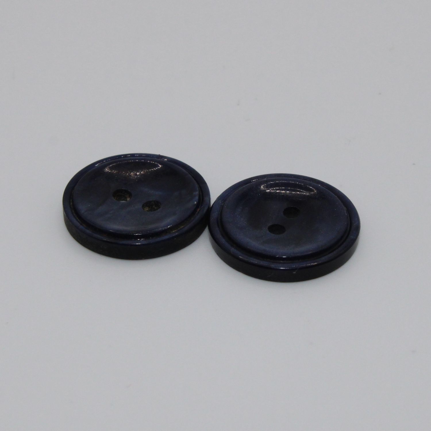 Set van 2 donkerblauwe knopen