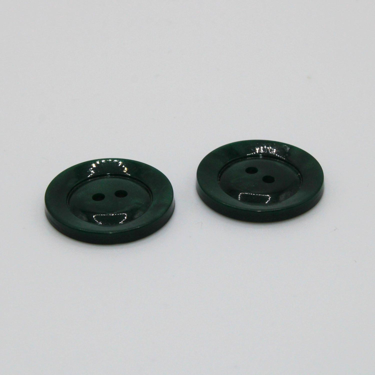 Set van 2 groene knopen