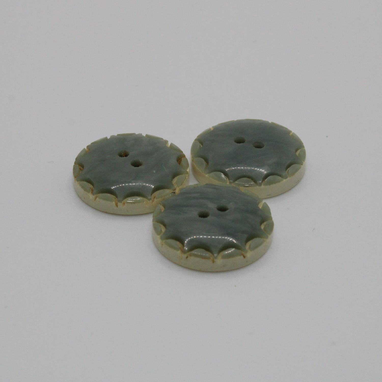 Set van 3 groenblauwe knopen