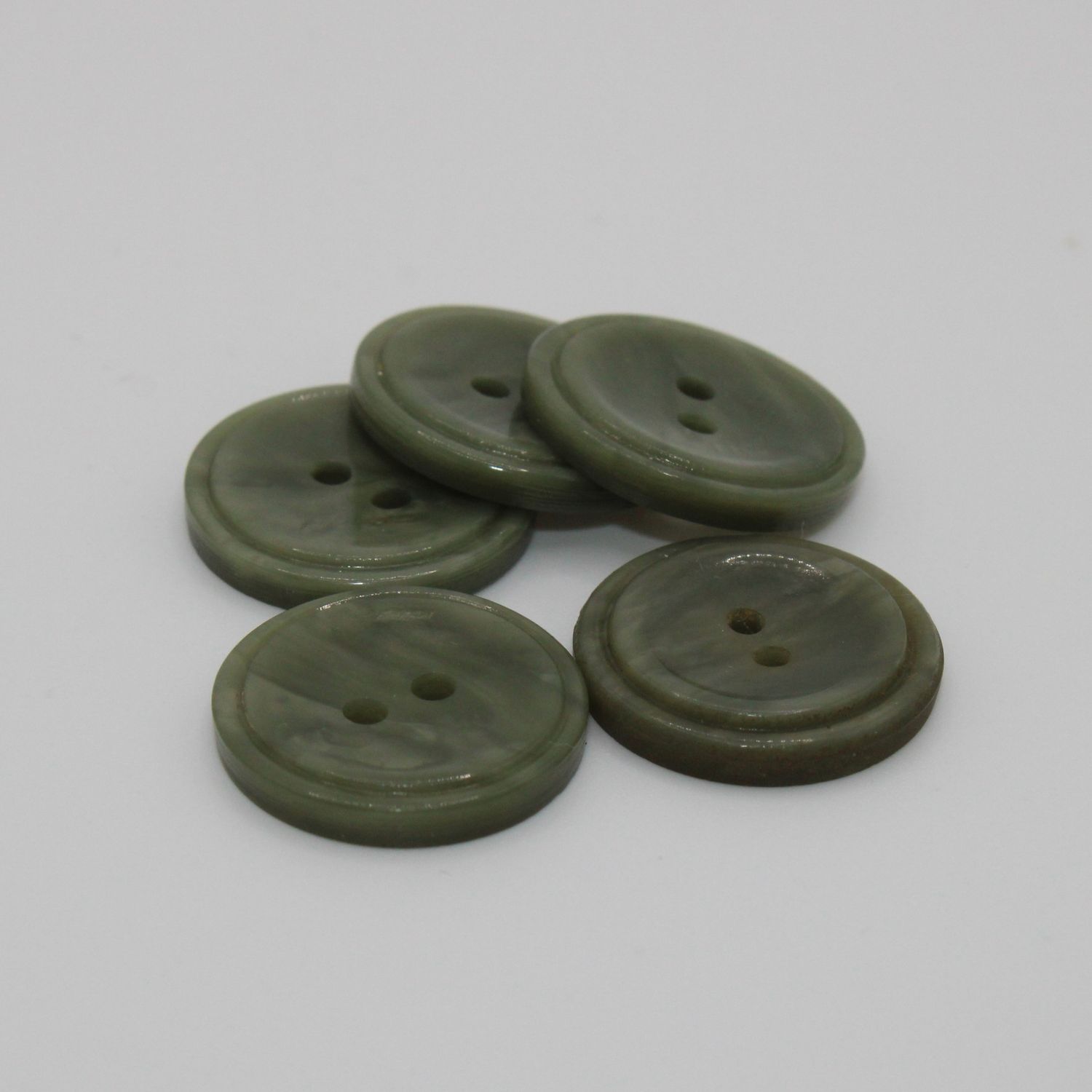 Set van 5 groene knopen