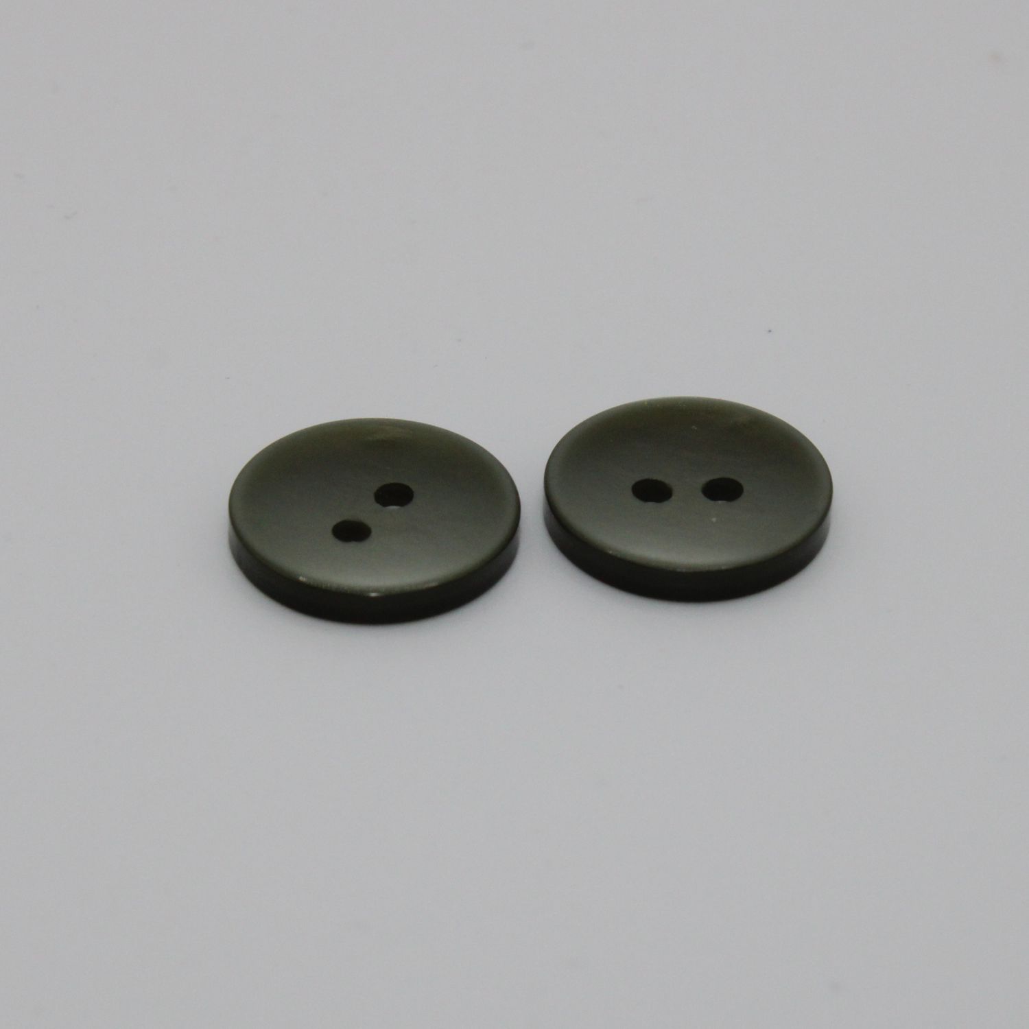 Set van 2 groene knopen