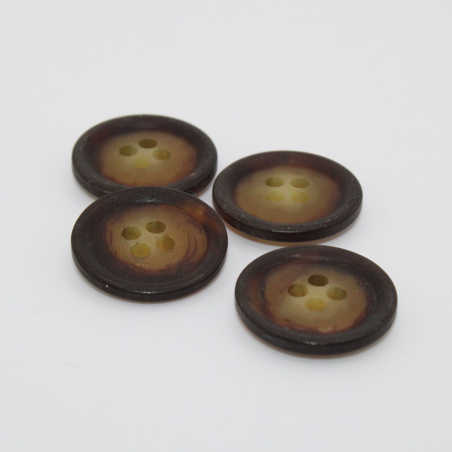 Set van 4 bruine knopen