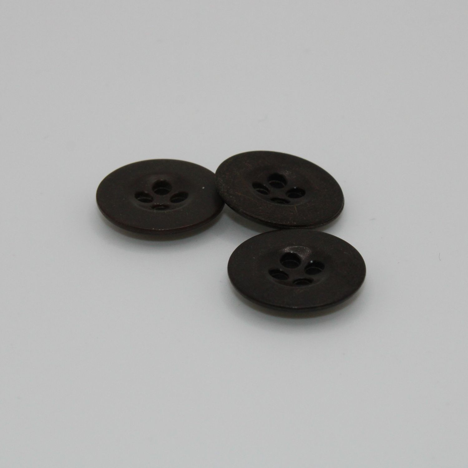 Set van 3 donkerbruine knopen