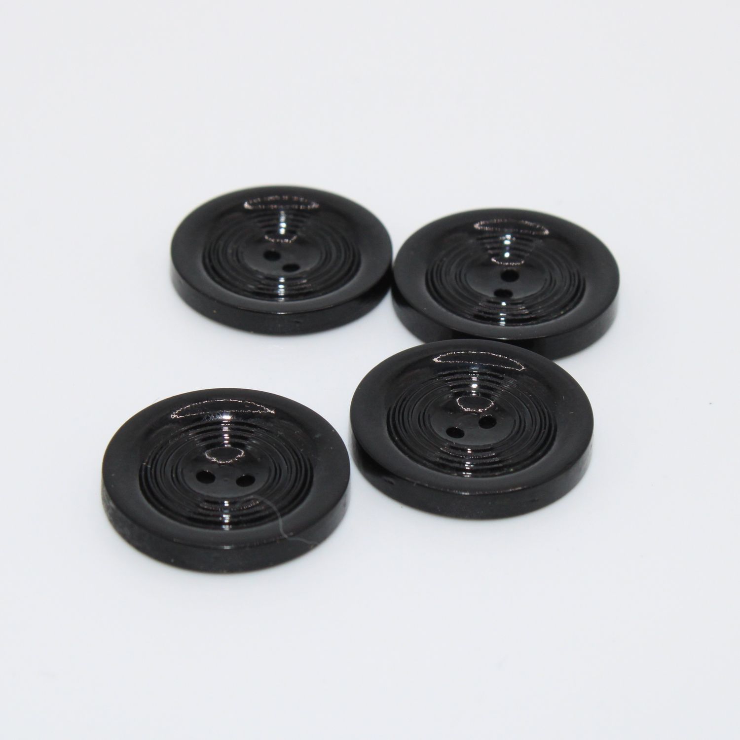 Set van 4 zwarte knopen