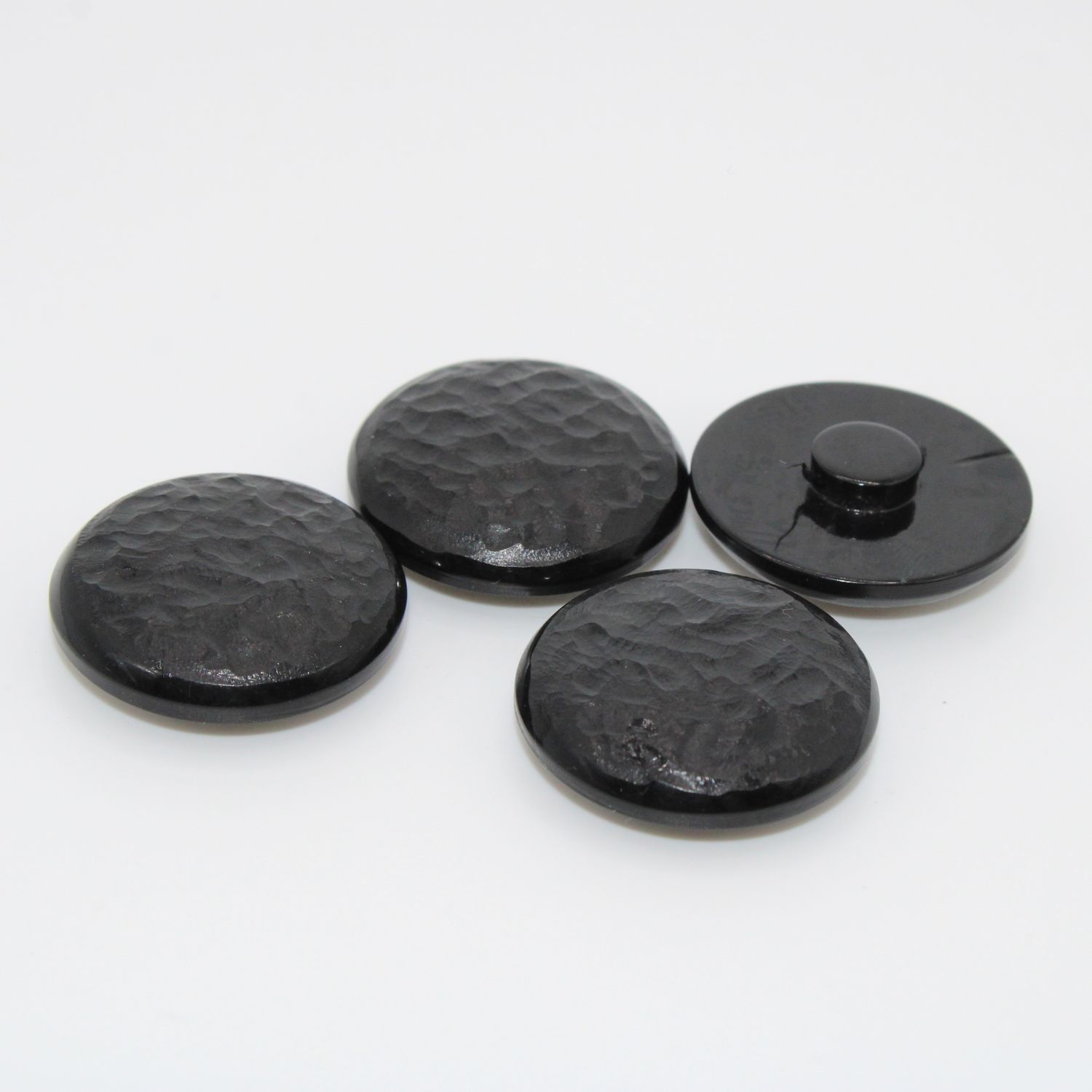 Set van 4 zwarte knopen