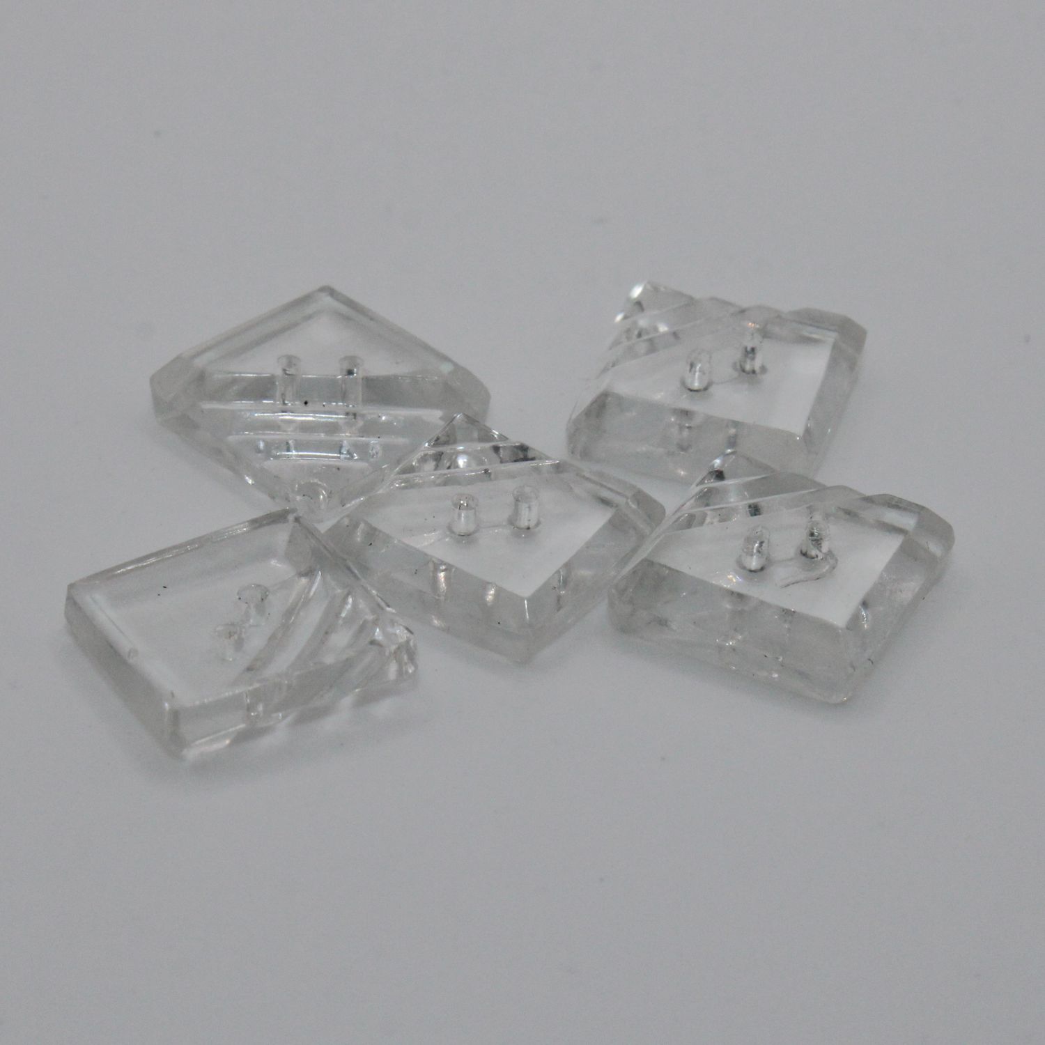Set van 5 witte doorzichtige knopen