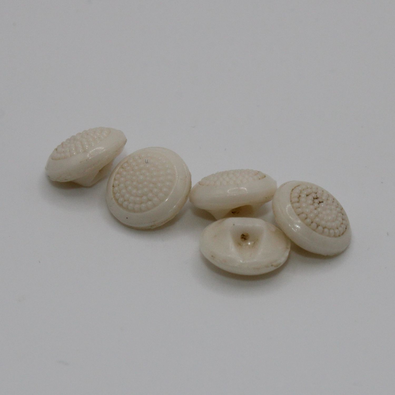 Set van 5 witte knopen