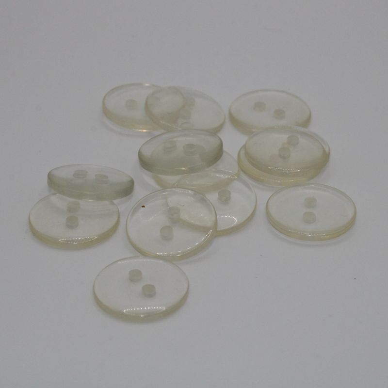 Set van 11 witte doorzichtige knopen