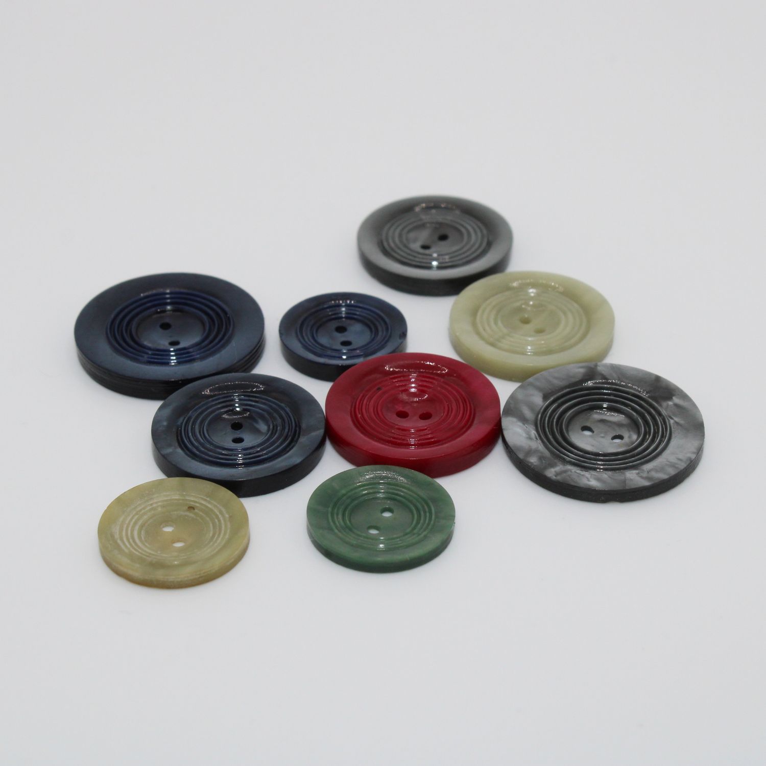 Set van 9 knopen in verschillende kleuren