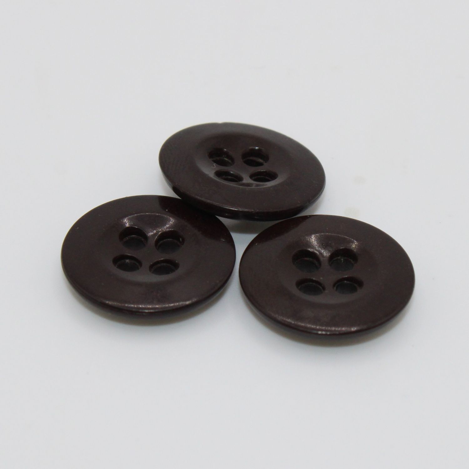 Set van 3 donkerbruine knopen