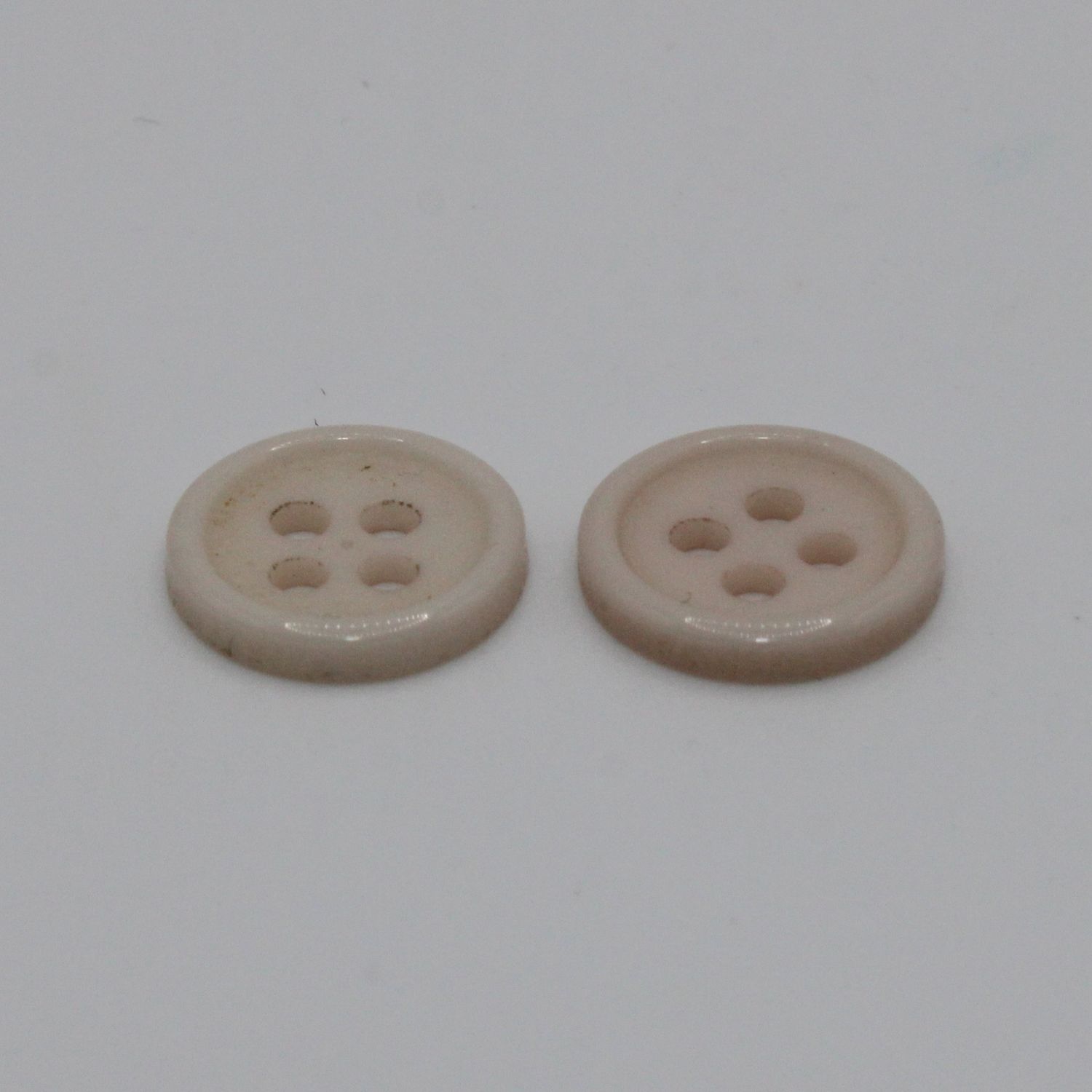Set van 2 lichtroze knopen
