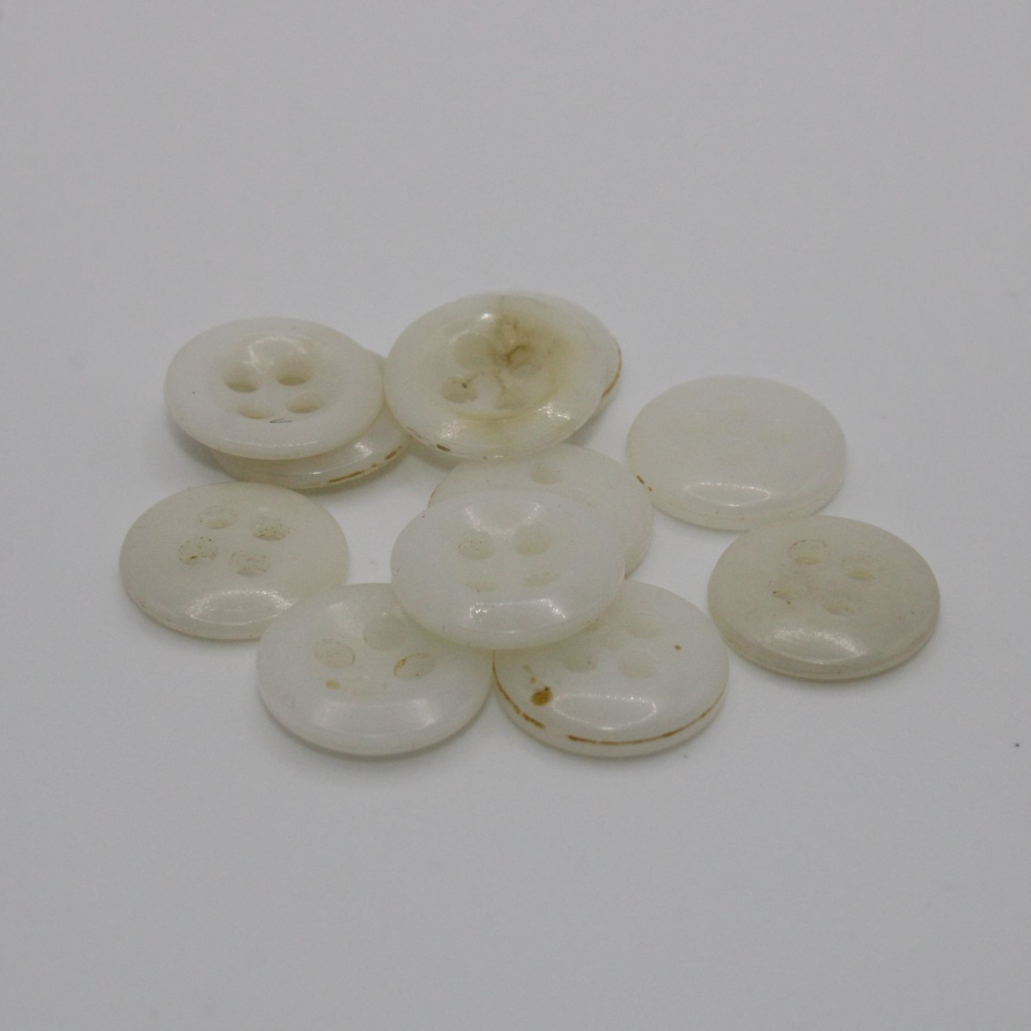 Set van 10 witte knopen