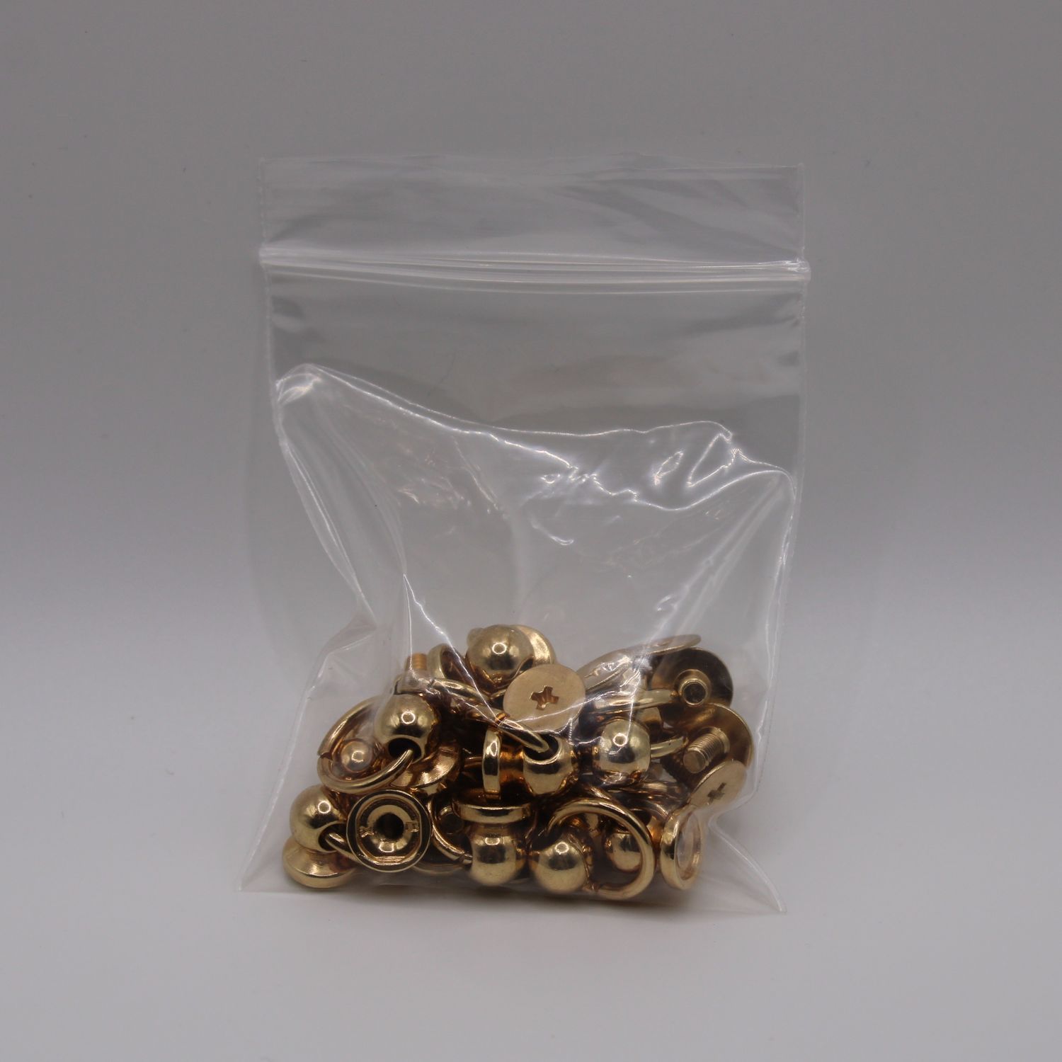 Goudkleurige bindschroeven (15 stuks)
