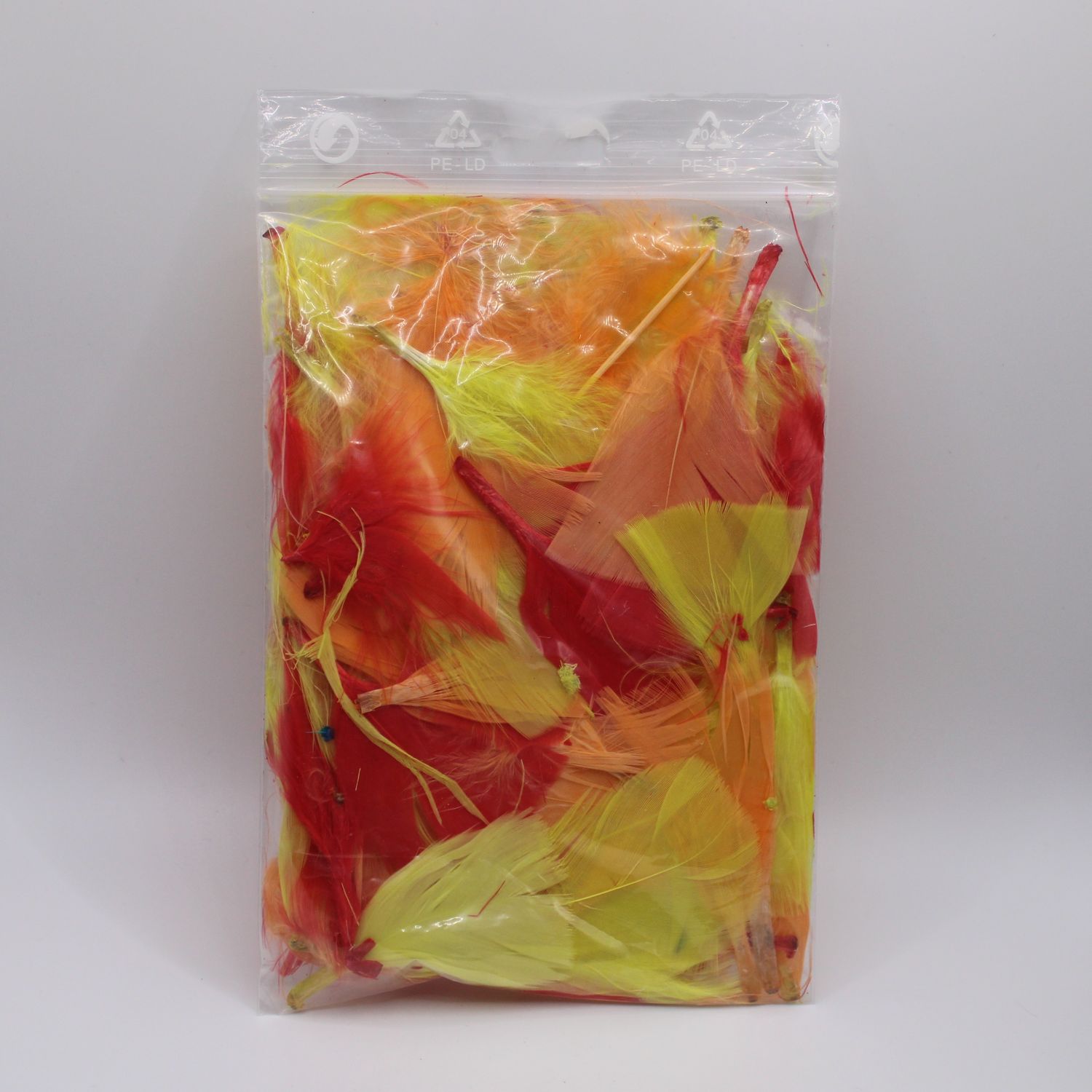 Zakje veren in verschillende kleuren