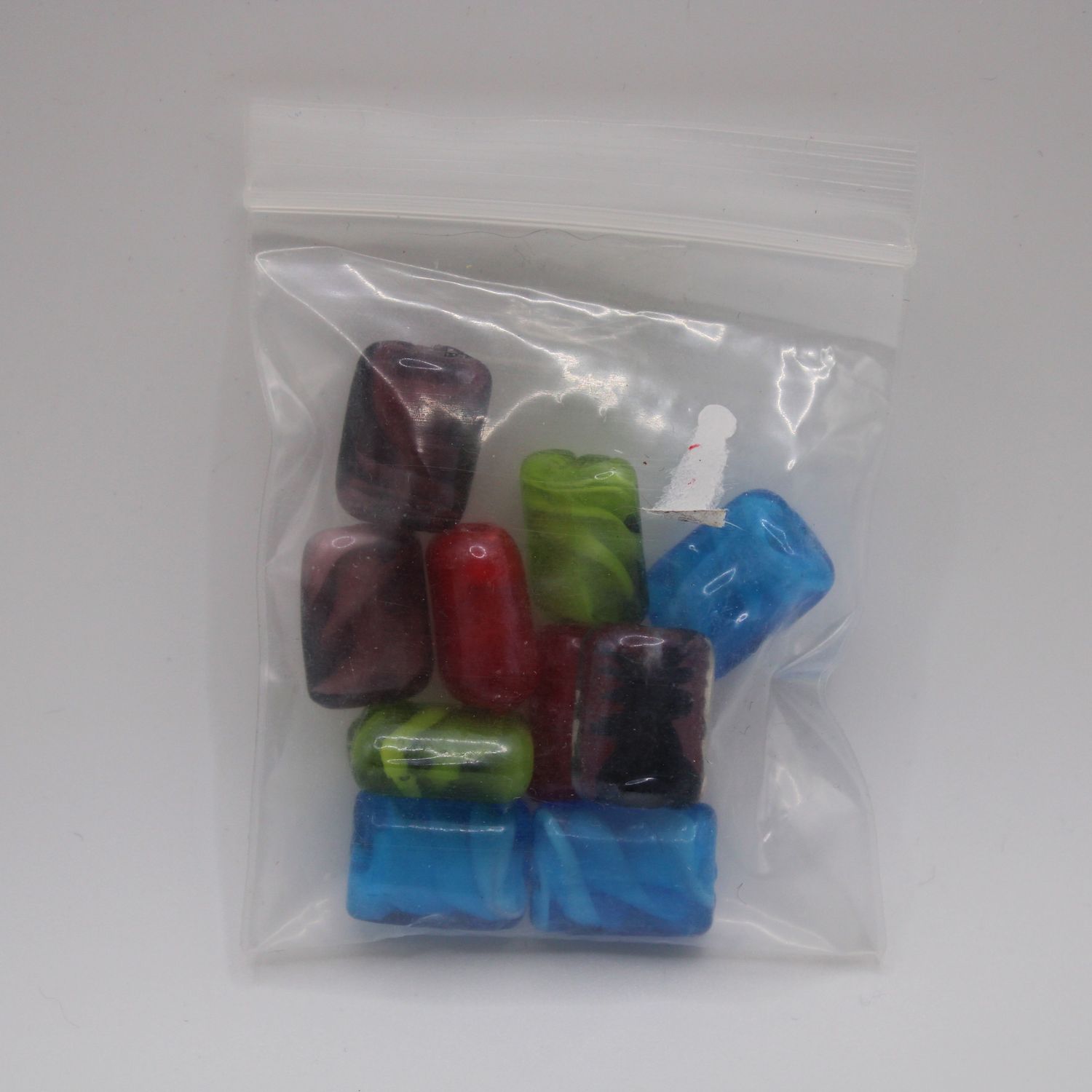 Zakje kralen in verschillende kleuren