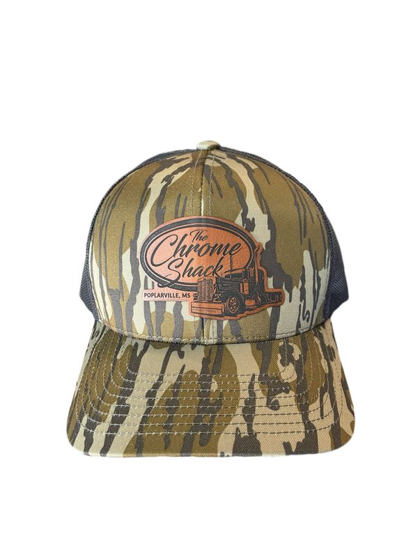 The Chrome Shack Leather Patch Trucker Hat - Bottomland Camo