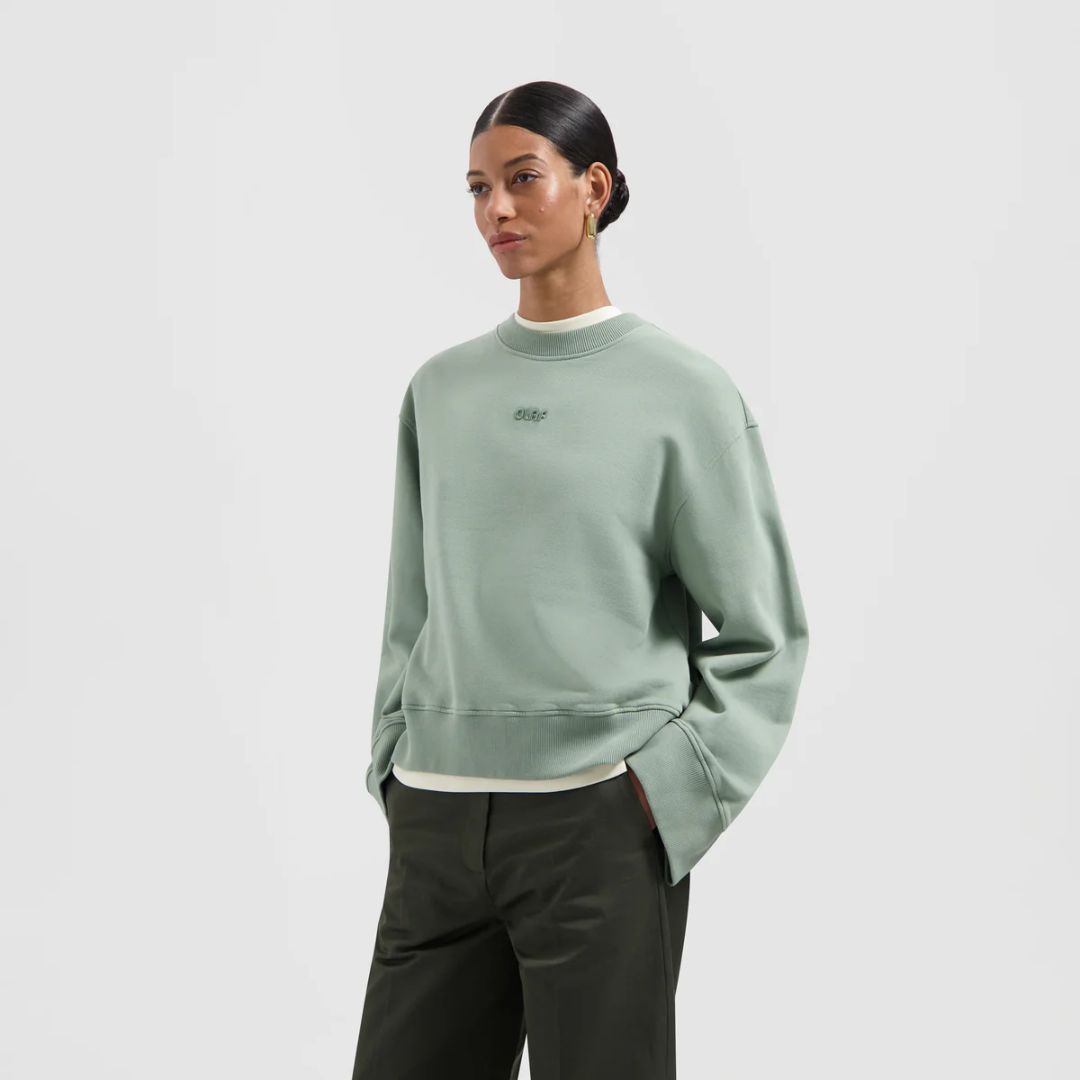 groene damessweater met logo van Olaf